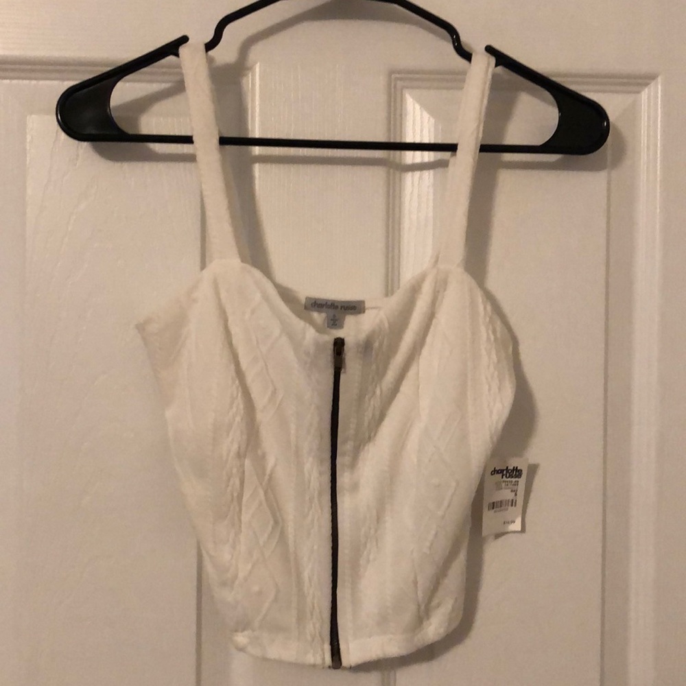 5 for $20 or price listed.White zip front crop top